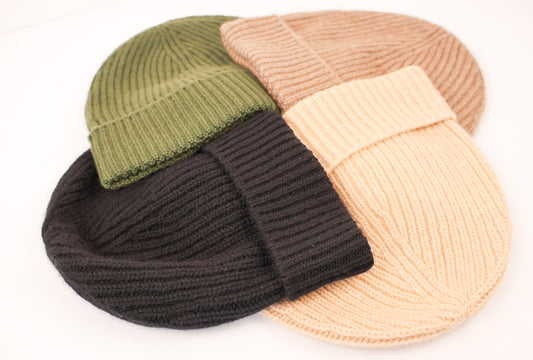 4 Classic Cashmere Beanies arranged in an overlapping circle pattern