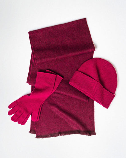 Everwarm Cashmere Beanie laid with the Eterna Gloves and Noble Scarf